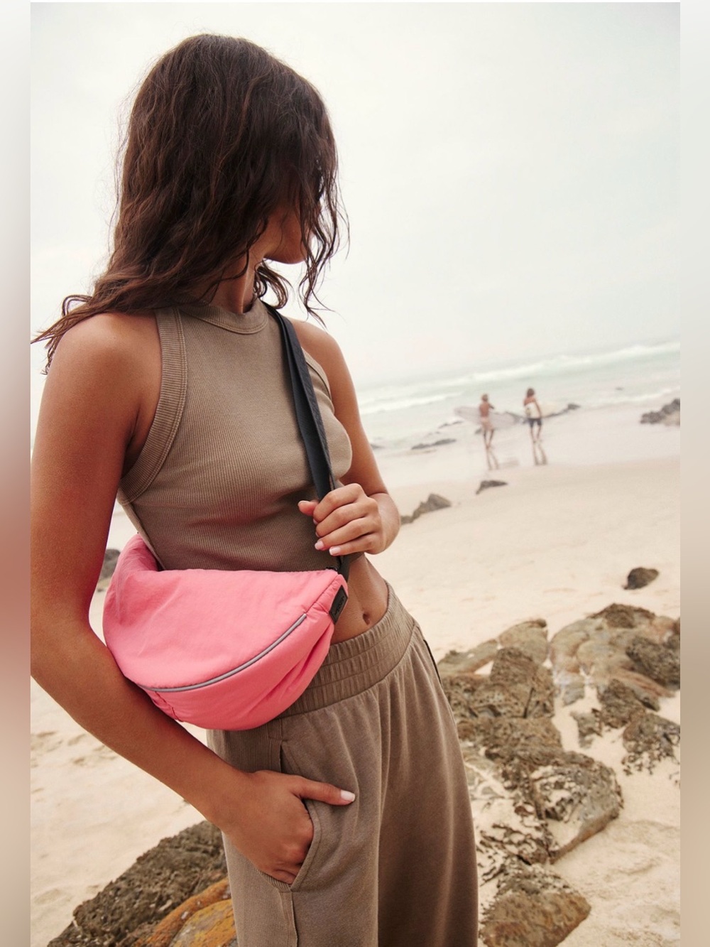 Free people movement coral NWT $40 bulls eye sling bag